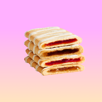 Stack of four pastries with white icing drizzle and red jam or brown filling visible in cross-sections.