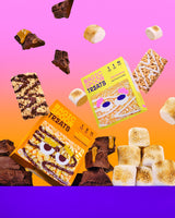 Assorted cereal treats including chocolate-drizzled bars, marshmallow pieces, and crispy squares displayed with two branded b