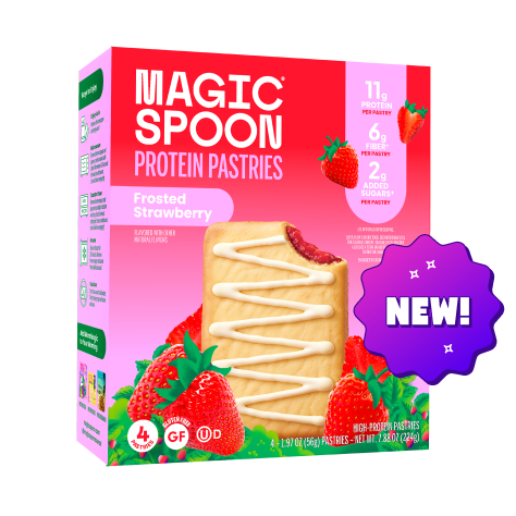 Magic Spoon Frosted Strawberry Protein Pastries box with pastries visible and fresh strawberries displayed.