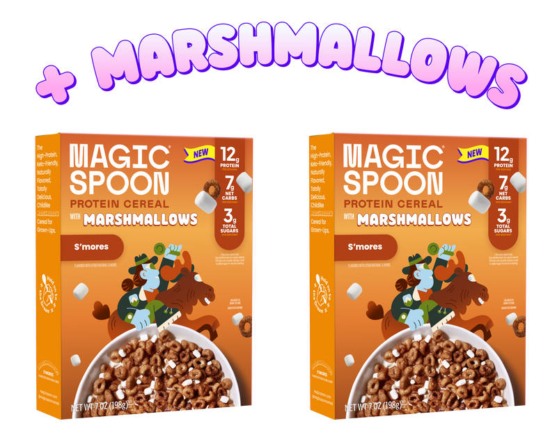Two orange Magic Spoon S'mores protein cereal boxes with marshmallows and brown cereal pieces visible in bowls on the packagi