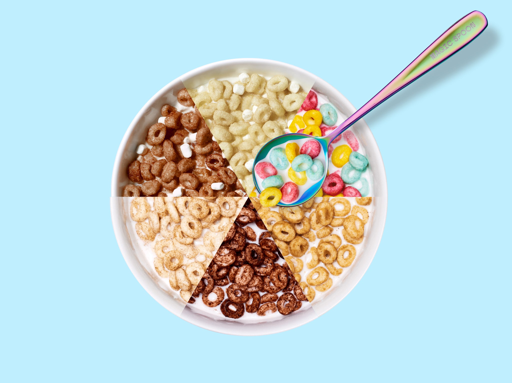 White bowl divided into six sections with different colored cereals and a small bowl of colorful marshmallows in the center, 